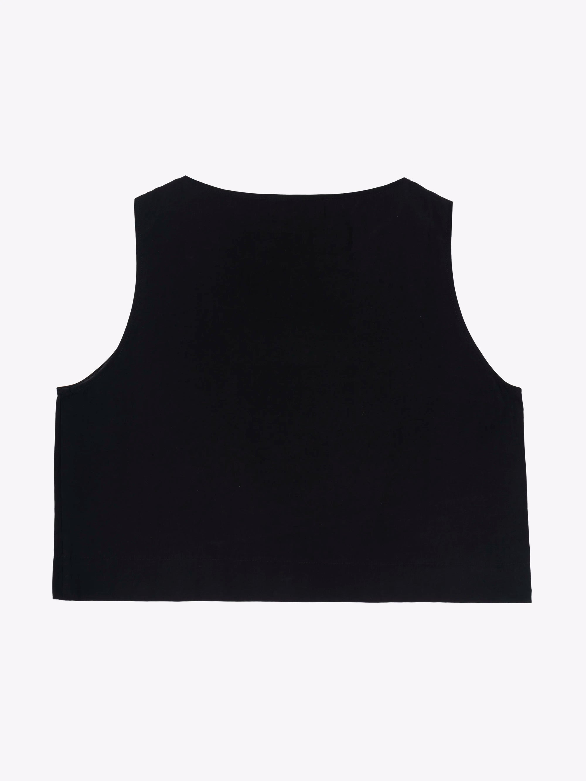 CROP TOP FLUIDO CON BAJO ASIMÉTRICO