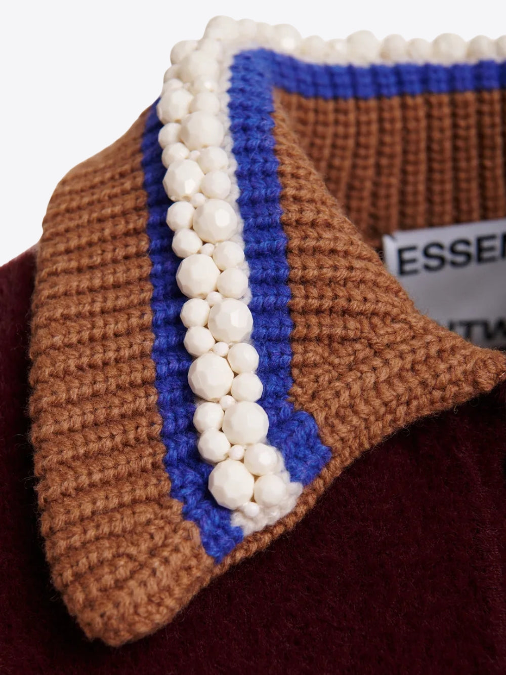 BOMBER DE PUNTO CON CUELLO DE CUENTAS